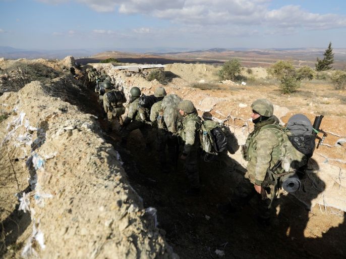 Turkish forces are seen on Mount Barsaya in northeast of Afrin, Syria January 28, 2018.REUTERS/ Khalil Ashawi