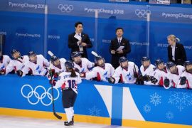 GANGNEUNG, SOUTH KOREA - FEBRUARY 20: Korean team mates celebrate after scoring a goal in the first period against Sweden during the Women's Classifications game on day eleven of the PyeongChang 2018 Winter Olympic Games at Kwandong Hockey Centre on February 20, 2018 in Gangneung, South Korea. (Photo by Andreas Rentz/Getty Images,)