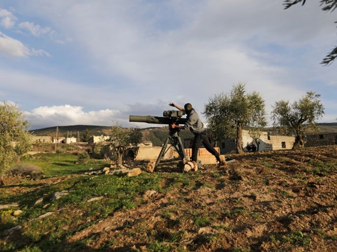 Turkish-backed Free Syrian Army fighter uses a TOW anti-tank missile north of the city of Afrin, Syria, February 18, 2018. REUTERS/Khalil Ashawi