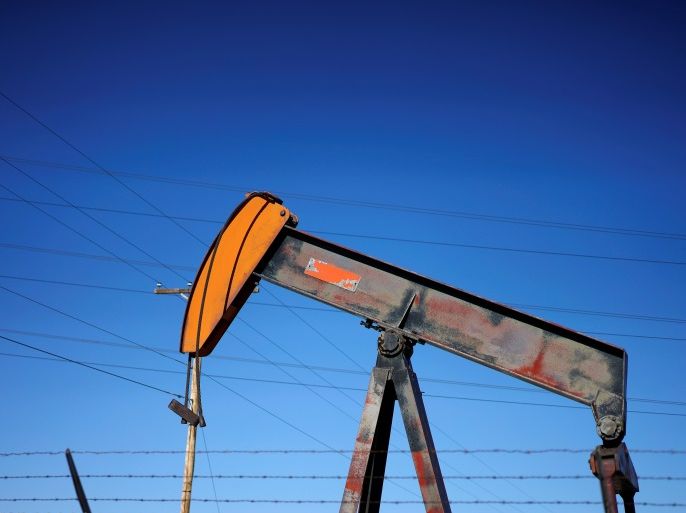 An oil well pump jack is seen at an oil field supply yard near Denver, Colorado, U.S., February 2, 2015. REUTERS/Rick Wilking/File Photo