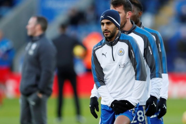 Soccer Football - Premier League - Leicester City vs Huddersfield Town - King Power Stadium, Leicester, Britain - January 1, 2018 Leicester City's Riyad Mahrez and Shinji Okazaki during the warm up before the match Action Images via Reuters/Andrew Boyers EDITORIAL USE ONLY. No use with unauthorized audio, video, data, fixture lists, club/league logos or