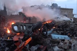 صور لحطام الطائرة الروسية التي سقطت بريف إدلب