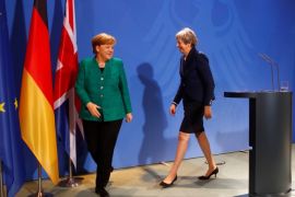German Chancellor Angela Merkel and Britain's Prime Minister Theresa May after a news conference in Berlin, Germany, February 16, 2018. REUTERS/Hannibal Hanschke