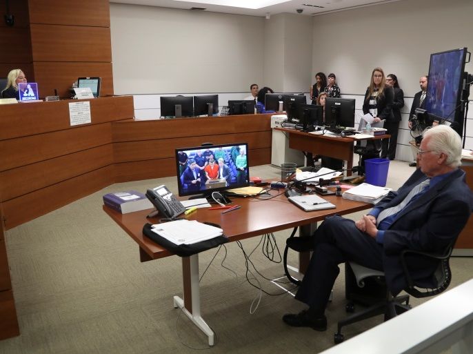 Nikolas Cruz appears via video monitor at a bond court hearing after being charged with 17 counts of premeditated murder, in Fort Lauderdale, Florida, U.S., February 15, 2018. REUTERS/Susan Stocker/Pool