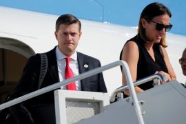 White House Staff Secretary Rob Porter (L) arrives aboard Air Force One with fellow senior staff and U.S. President Donald Trump for a summer vacation at his Bedminster estate, at Morristown Airport in Morristown, New Jersey, U.S. August 4, 2017. Picture taken August 4, 2017. REUTERS/Jonathan Ernst