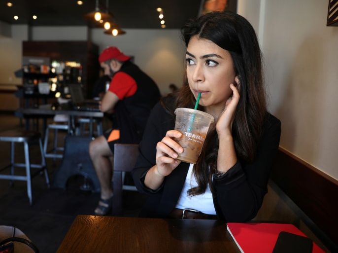 DACA recipient Martha Valenzuela, 23, sits in a coffee shop in Orange, California, U.S., January 23, 2018. Valenzuela is a Cal State Fullerton graduate who came to the U.S. from Sinaloa, Mexico, when she was two years old. Valenzuela's mother crossed the Arizona desert to join her and her father in the U.S. REUTERS/Lucy Nicholson