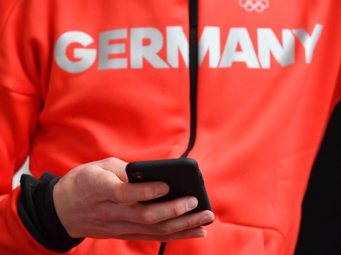 MUNICH, GERMANY - JANUARY 22: Richard Freitag uses his smartphone during the 2018 PyeongChang Olympic Games German Team kit handover at Postpalast on January 22, 2018 in Munich, Germany. (Photo by Sebastian Widmann/Bongarts/Getty Images)