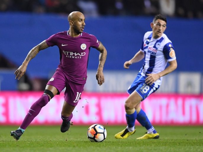 WIGAN, ENGLAND - FEBRUARY 19: Fabian Delph of Manchester City runs with the ball during the Emirates FA Cup Fifth Round match between Wigan Athletic and Manchester City at DW Stadium on February 19, 2018 in Wigan, England. (Photo by Gareth Copley/Getty Images)