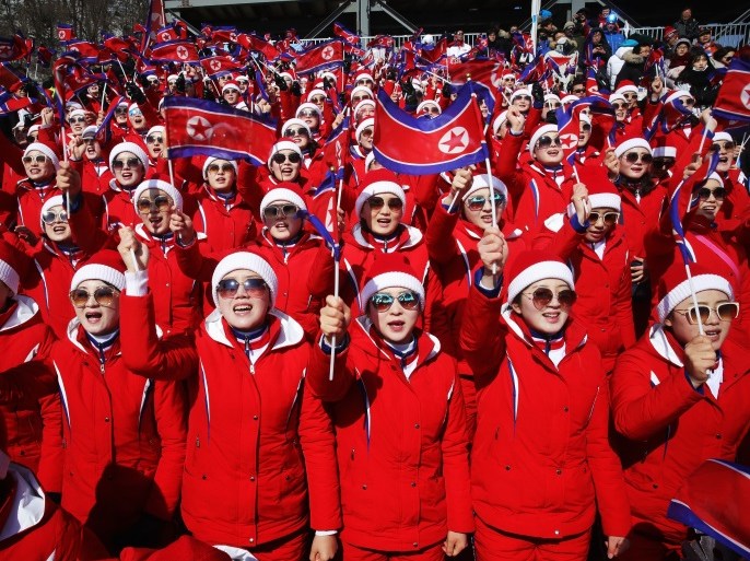 PYEONGCHANG-GUN, SOUTH KOREA - FEBRUARY 22: North Korea fans cheer at the finish during the Men's Slalom on day 13 of the PyeongChang 2018 Winter Olympic Games at Yongpyong Alpine Centre on February 22, 2018 in Pyeongchang-gun, South Korea. (Photo by Alexander Hassenstein/Getty Images)