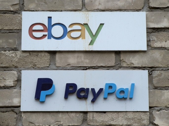 Signs are posted outside the offices of online marketplace eBay and its electronic payments division PayPal in Toronto April 5, 2015. REUTERS/Chris Helgren