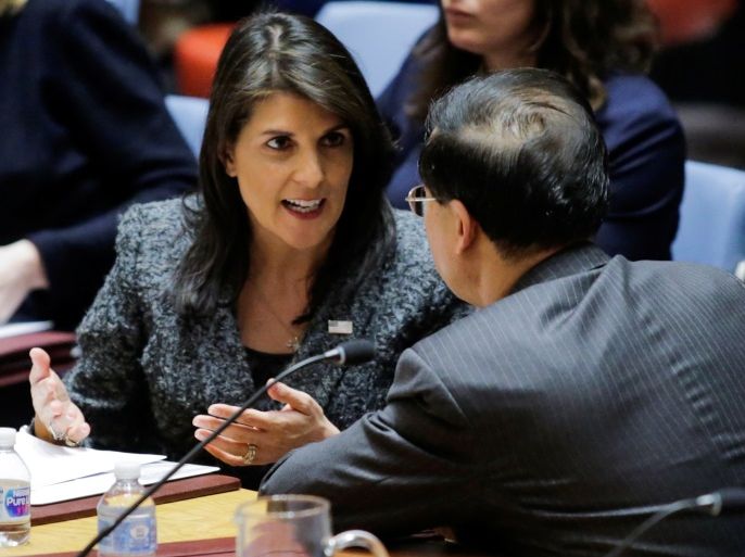 U.S. Ambassador to the United Nations Nikki Haley (L) speaks to China's ambassador to the U.N. Ma Zhaoxu before the United Nations Security Council vote for ceasefire to Syrian bombing in eastern Ghouta, at the United Nations headquarters in New York, U.S., February 24, 2018. REUTERS/Eduardo Munoz