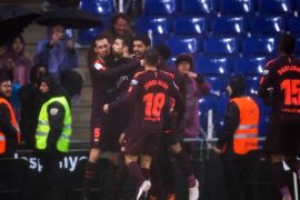 BARCELONA, SPAIN - FEBRUARY 04: Gerard Pique of FC Barcelona celebrates with teammates after scoring his team's first goal during the La Liga match between Espanyol and Barcelona at RCDE Stadium on February 4, 2018 in Barcelona, Spain. (Photo by Alex Caparros/Getty Images)