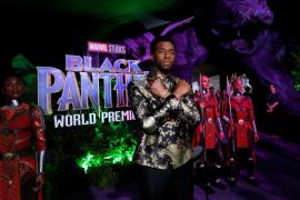Cast member Chadwick Boseman poses at the premiere of