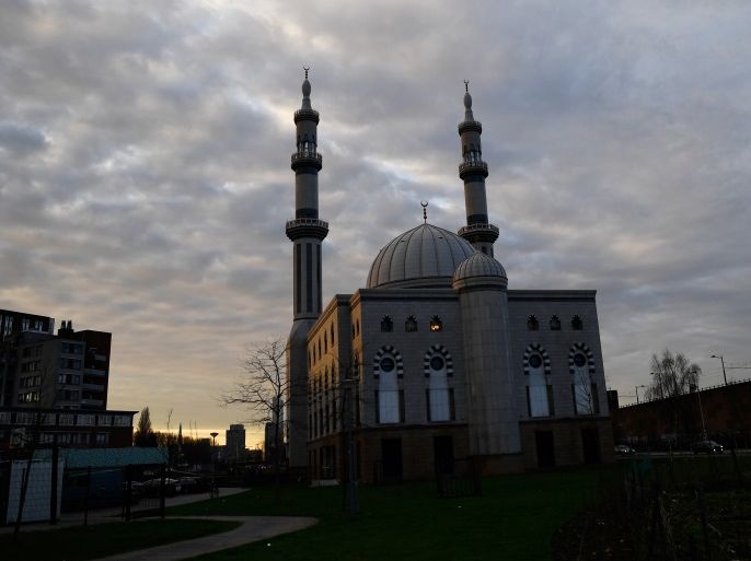 The sun sets behind the Essalam Mosque in Rotterdam, Netherlands, March 10, 2017. The Dutch election takes place March 15. Picture taken March 10, 2017. REUTERS/Dylan Martinez