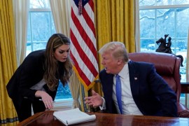 U.S. President Donald Trump confers with White House Communications Director Hope Hicks during an interview with Reuters at the White House in Washington, U.S., January 17, 2018. REUTERS/Kevin Lamarque