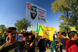 Supporters of Iraqi Hezbollah protest against the visit of Saudi Arabia's Crown Prince Mohammed bin Salman Al Saud, in Baghdad, Iraq March 30, 2018. REUTERS/Thaier Al-Sudani