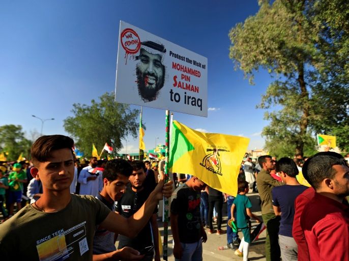 Supporters of Iraqi Hezbollah protest against the visit of Saudi Arabia's Crown Prince Mohammed bin Salman Al Saud, in Baghdad, Iraq March 30, 2018. REUTERS/Thaier Al-Sudani