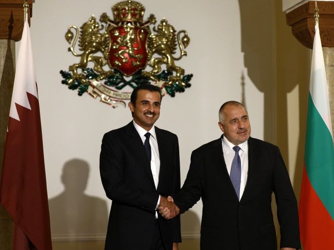 Bulgaria's Prime Minister Boyko Borissov welcomes Emir of Qatar Sheikh Tamim bin Hamad al-Thani before their meeting in Sofia, Bulgaria, March 8, 2018. REUTERS/Stoyan Nenov