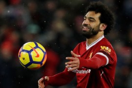 Soccer Football - Premier League - Liverpool vs Watford - Anfield, Liverpool, Britain - March 17, 2018 Liverpool's Mohamed Salah celebrates with the match ball after the match Action Images via Reuters/Lee Smith EDITORIAL USE ONLY. No use with unauthorized audio, video, data, fixture lists, club/league logos or