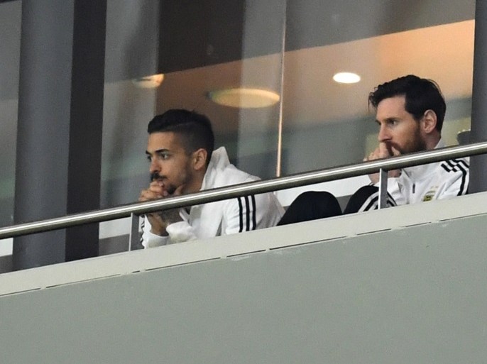 MADRID, SPAIN - MARCH 27: Lionel Messi of Argentina and Manuel Lanzini of Argentina watch from the stands during the International Friendly between Spain and Argentina on March 27, 2018 in Madrid, Spain. (Photo by David Ramos/Getty Images)