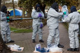 SALISBURY, ENGLAND - MARCH 16: Police officers in protective suits and masks collect samples near the scene where former double-agent Sergei Skripal and his daughter, Yulia were discovered after being attacked with a nerve-agent on March 16, 2018 in Salisbury, England. Britain has expelled 23 Russian diplomats over the nerve agent attack on former spy Sergei Skripal and his daughter Yulia, who both remain in a critical condition. Russian Foreign Minister Sergei Lavrov h