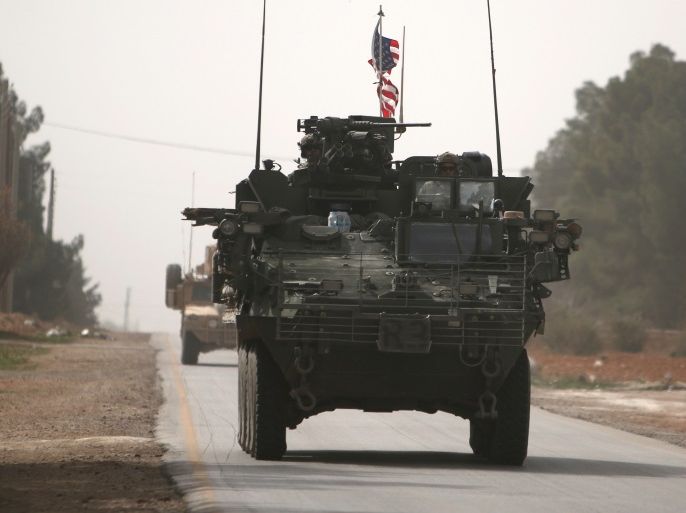American army vehicles drive north of Manbij city, in Aleppo Governorate, Syria March 9, 2017. REUTERS/Rodi Said