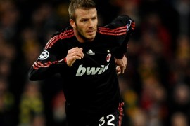 MANCHESTER, ENGLAND - MARCH 10: David Beckham of AC Milan on the ball during the UEFA Champions League First Knockout Round, second leg match between Manchester United and AC Milan at Old Trafford on March 10, 2010 in Manchester, England. (Photo by Laurence Griffiths/Getty Images)