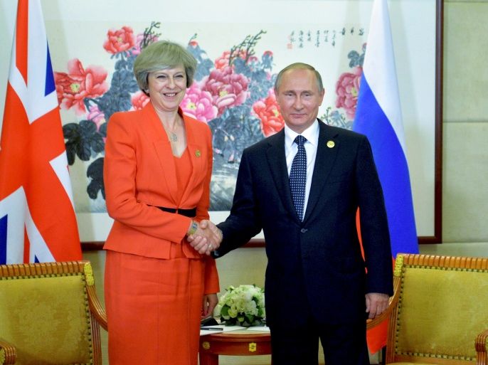 Russian President Vladimir Putin meets with British Prime Minister Theresa May as part of the G20 Summit in Hangzhou, China, September 4, 2016. Sputnik/Kremlin/Alexei Druzhinin/via REUTERS ATTENTION EDITORS - THIS IMAGE WAS PROVIDED BY A THIRD PARTY. EDITORIAL USE ONLY.