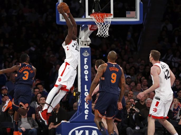 Mar 11, 2018; New York, NY, USA; Toronto Raptors forward Pascal Siakam (43) dunks the ball in front of New York Knicks forward Tim Hardaway Jr. (3) during the second half at Madison Square Garden. Mandatory Credit: Adam Hunger-USA TODAY Sports