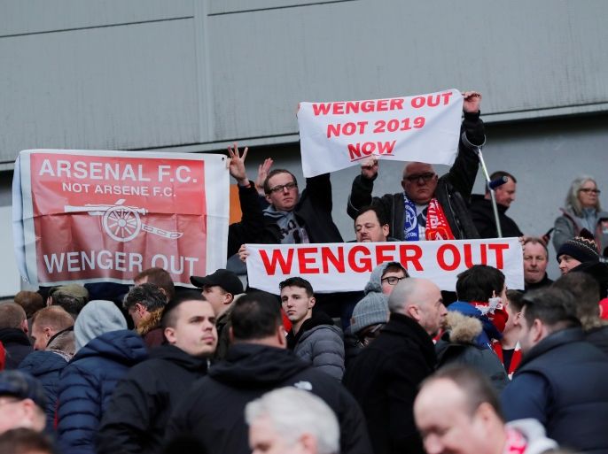 Soccer Football - Premier League - Brighton & Hove Albion vs Arsenal - The American Express Community Stadium, Brighton, Britain - March 4, 2018 Arsenal fans display banners in reference to manager Arsene Wenger REUTERS/Eddie Keogh EDITORIAL USE ONLY. No use with unauthorized audio, video, data, fixture lists, club/league logos or