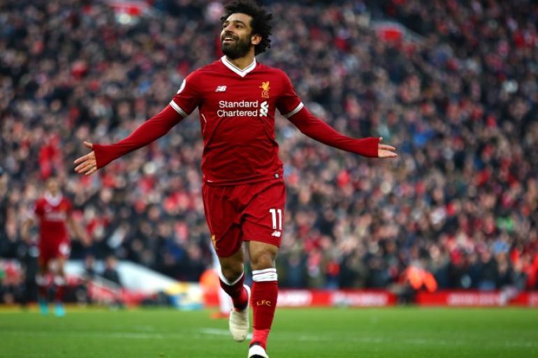 LIVERPOOL, ENGLAND - FEBRUARY 24: Mohamed Salah of Liverpool celebrates scoring his side's second goal during the Premier League match between Liverpool and West Ham United at Anfield on February 24, 2018 in Liverpool, England. (Photo by Clive Brunskill/Getty Images)
