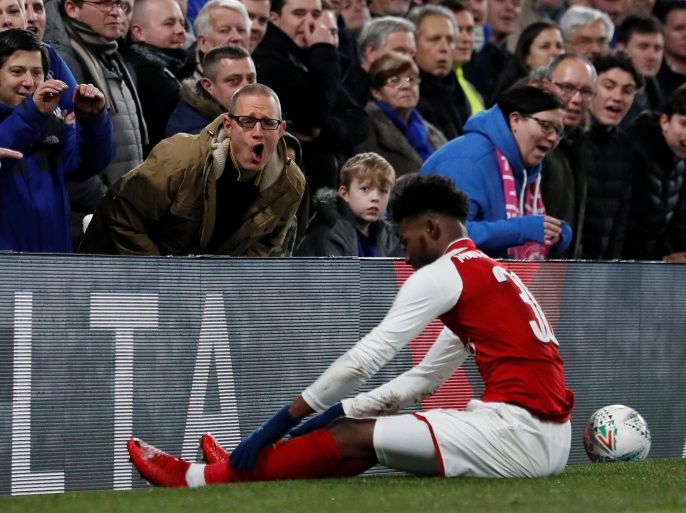 Soccer Football - Carabao Cup Semi Final First Leg - Chelsea vs Arsenal - Stamford Bridge, London, Britain - January 10, 2018 Arsenal's Ainsley Maitland-Niles as Chelsea fans look on REUTERS/David Klein EDITORIAL USE ONLY. No use with unauthorized audio, video, data, fixture lists, club/league logos or