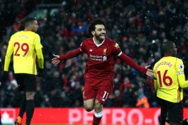 LIVERPOOL, ENGLAND - MARCH 17: Mohamed Salah of Liverpool celebrates scoring his side's fourth goal during the Premier League match between Liverpool and Watford at Anfield on March 17, 2018 in Liverpool, England. (Photo by Jan Kruger/Getty Images)