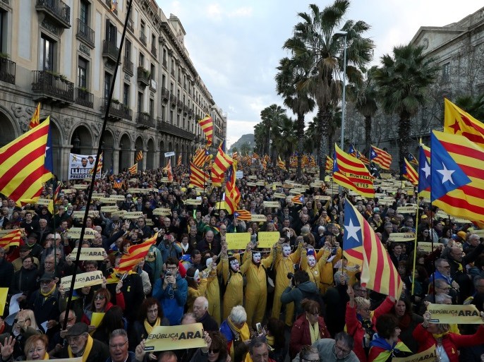 People attend a demonstration held by pro-independence associations in Barcelona, Spain March 11, 2018. REUTERS/Albert Gea