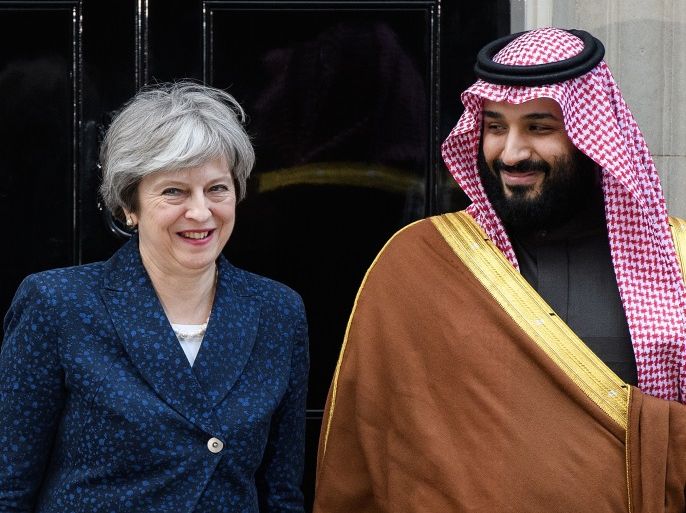 LONDON, ENGLAND - MARCH 07: British Prime Minister Theresa May (L) stands with Saudi Crown Prince Mohammed bin Salman on the steps of number 10 Downing Street on March 7, 2018 in London, England. Saudi Crown Prince Mohammed bin Salman has made wide-ranging changes at home supporting a more liberal Islam. Whilst visiting the UK he will meet with several members of the Royal family and the Prime Minister. (Photo by Leon Neal/Getty Images)