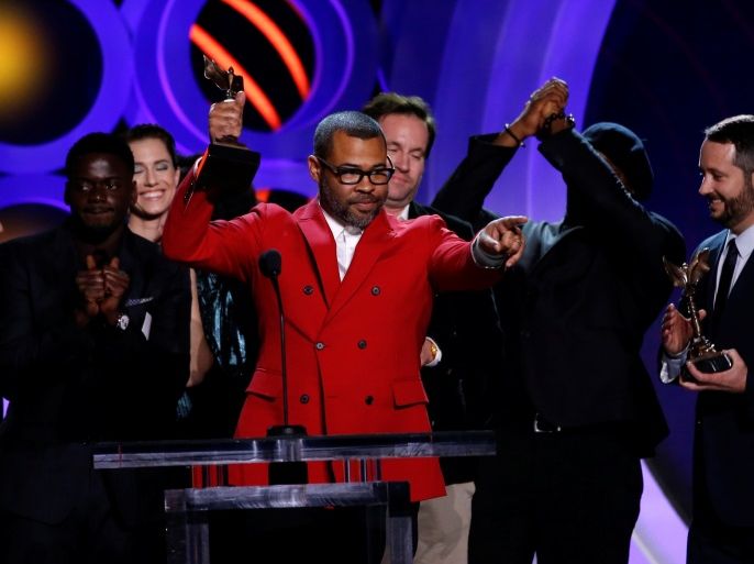 2018 Film Independent Spirit Awards - Show - Santa Monica, California, U.S., 03/03/2018 - Producer and Director Jordan Peele accepts the Best Feature Award accompanied by the cast of his film