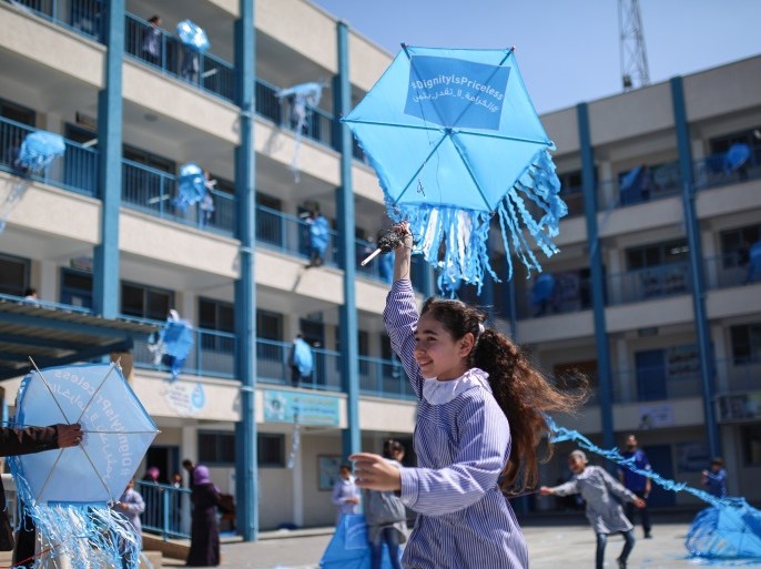 مدرسة للأونروا تشارك في الفعالية بغزة (الأناضول)