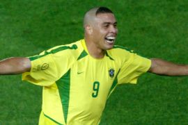 Brazil's Ronaldo celebrates after he scored the second goal during the World Cup final against [Germ..
