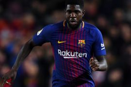 BARCELONA, SPAIN - JANUARY 28: Samuel Umtiti of FC Barcelona runs with the ball during the La Liga match between Barcelona and Deportivo Alaves at Camp Nou on January 28, 2018 in Barcelona, Spain. (Photo by David Ramos/Getty Images)