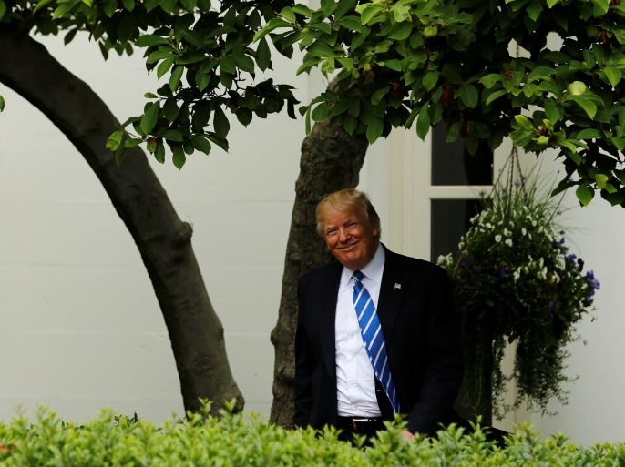 U.S. President Donald Trump arrives to deliver remarks to members of the Independent Community Bankers Association in the Kennedy Garden at the White House in Washington, U.S., May 1, 2017. REUTERS/Jonathan Ernst