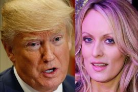 Adult-film actress Stephanie Clifford, also known as Stormy Daniels, poses for pictures at the end of her striptease show in Gossip Gentleman club in Long Island, New York, U.S., February 23, 2018. REUTERS/Eduardo Munoz U.S. President Donald Trump speaks during a round table meeting with members of law enforcement about sanctuary cities in the Roosevelt Room at the White House in Washington, U.S., March 20, 2018. REUTERS/Leah Millis