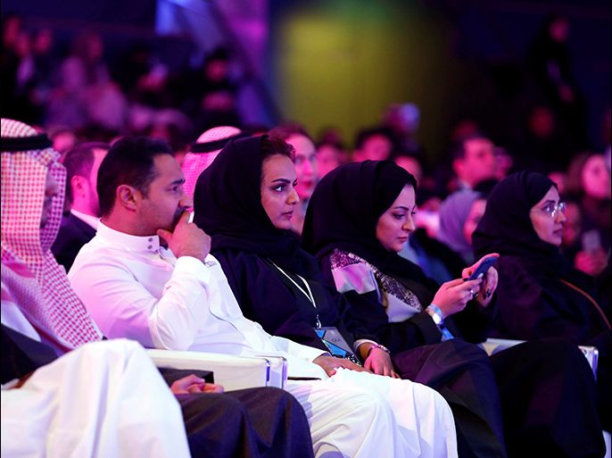 People attend the performance of actor John Travolta at APEX Convention Center in Riyadh, Saudi Arabia December 15, 2017. REUTERS/Faisal al Nasser - RC182D50CD10
