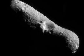 385446 03: FILE PHOTO: A mosaic image of asteroid Eros at it's north pole, taken by the robotic NEAR Shoemaker space probe February 14, 2000 immediately after the spacecraft's insertion into orbit. After a year of circling and taking pictures, NEAR will touch down on asteroid Eros February 12, 2001, to capture surface details, which will be the first time any craft has tried to land on a tumbling space rock. (Photo Courtesy of NASA/Newsmakers)