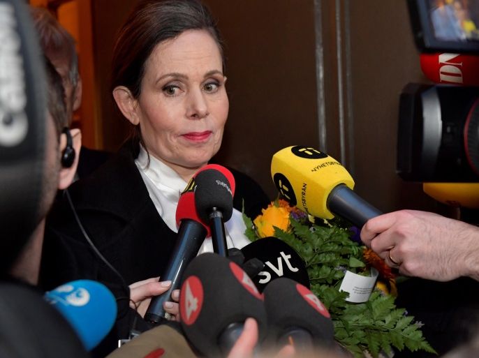 The Swedish Academy's Permanent Secretary Sara Danius talks to the media as she leaves after a meeting at the Swedish Academy in Stockholm, Sweden April 12, 2018. Danius said to journalists that she would leave her position and the Swedish Academy immediately. TT News Agency/Jonas Ekstromer/ via REUTERS ATTENTION EDITORS - THIS IMAGE WAS PROVIDED BY A THIRD PARTY. SWEDEN OUT. NO COMMERCIAL OR EDITORIAL SALES IN SWEDEN