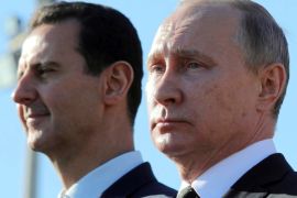 Russian President Vladimir Putin (R) and Syrian President Bashar al-Assad visit the Hmeymim air base in Latakia Province, Syria December 11, 2017. Picture taken December 11, 2017. To match Special Report RUSSIA-FLIGHTS/ Sputnik/Mikhail Klimentyev/ via REUTERS/File Photo ATTENTION EDITORS - THIS IMAGE WAS PROVIDED BY A THIRD PARTY.