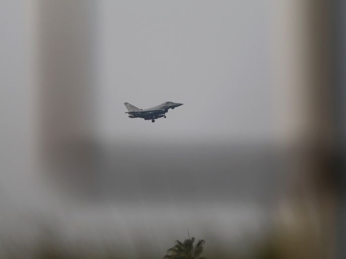 A fighter jet prepares to land at RAF Akrotiri, a military base Britain maintains on Cyprus, April 14, 2018. REUTERS/Yiannis Kourtoglou