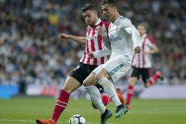 MADRID, SPAIN - APRIL 18: Cristiano Ronaldo (R) of Real Madrid CF competes for the ball with Unai Nunez Gestoso (L) of Athletic Clubduring the La Liga match between Real Madrid CF and Athletic Club de Bilbao at Estadio Santiago Bernabeu on April 18, 2018 in Madrid, Spain. (Photo by Gonzalo Arroyo Moreno/Getty Images)