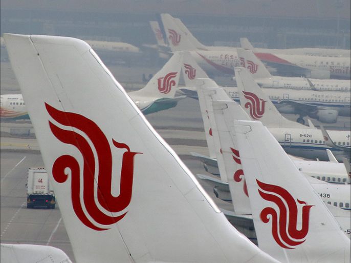 FILE PHOTO - Flights of Air China are parked on the tarmac of Beijing Capital International Airport in Beijing, China, March 28, 2016. REUTERS/Kim Kyung-Hoon/File Photo GLOBAL BUSINESS WEEK AHEAD