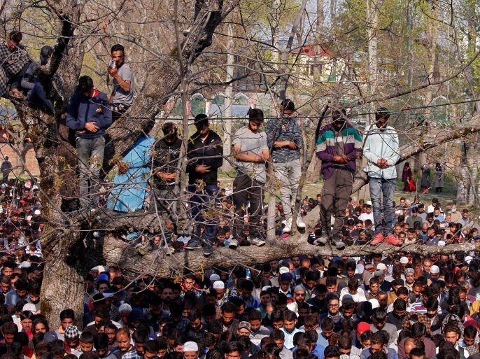People offer funeral prayers for Zubair Ahmed Turay, a suspected militant, in south Kashmir's Shopian district April 1, 2018. REUTERS/Danish Ismail