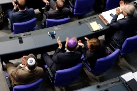 Members of the parliament wearing kippas attend a session of the lower house of parliament Bundestag in Berlin, Germany, April 26, 2018. REUTERS/Axel Schmidt